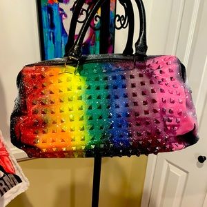 Custom hand-painted rainbow studded purse.